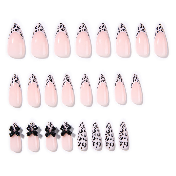 Artful Stiletto Nails with Leopard Print and Bow Accent Bowlift
