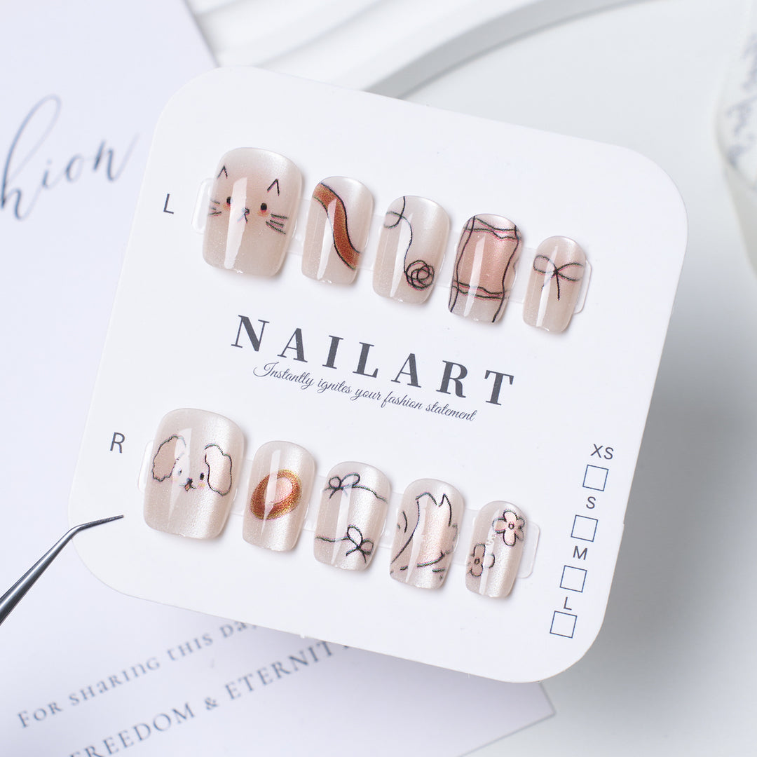Decorative Press-On Nail Extensions with Bow and Rhinestone Accents Bowlift