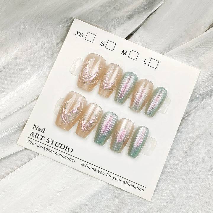 Artificial nail tips with shimmering design Bowlift