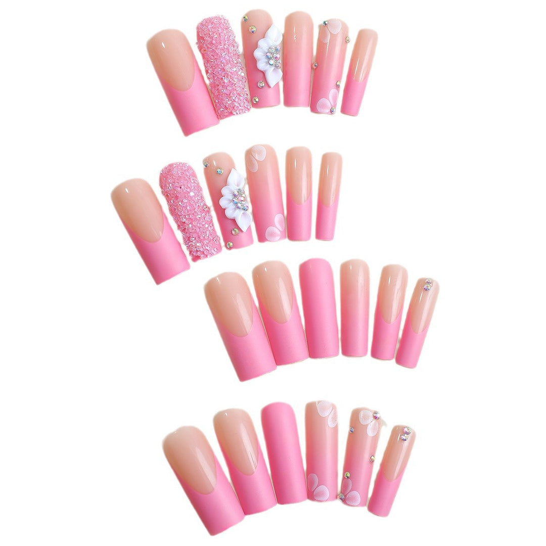 Acrylic nail set with sparkling glitter and delicate flower decorations Bowlift