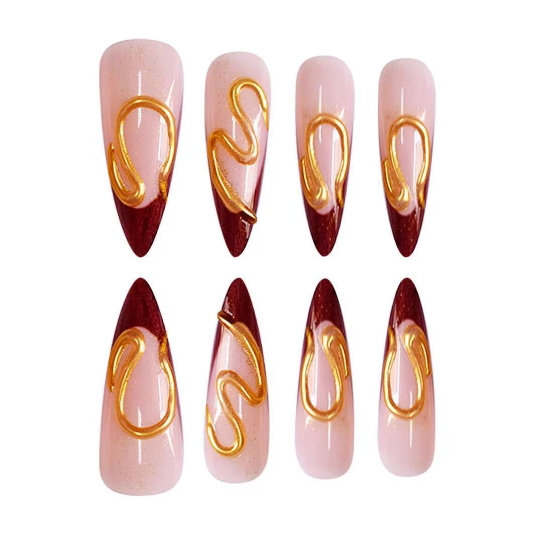 Artistic Stiletto Nail Extensions with Abstract Design Bowlift