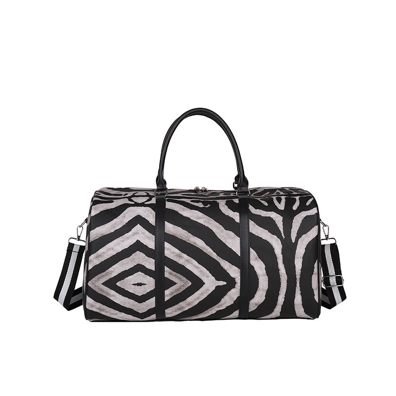 Sporty travel bag in trendy zebra pattern Bowlift