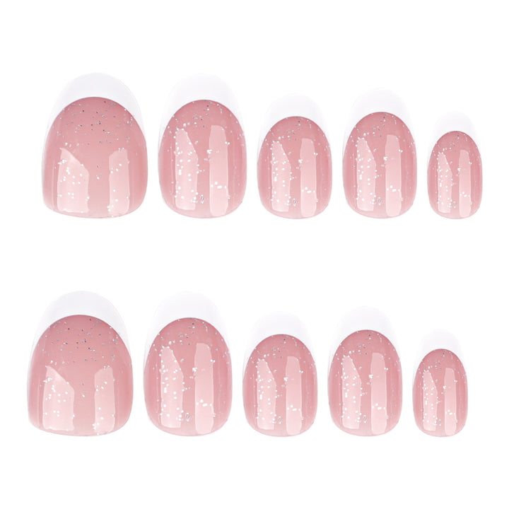 Artful nail art with glitter in gentle tones and elegant tips Bowlift