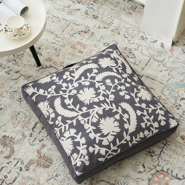 Padded chair cushion with carrying handle and decorative stitching Bowlift