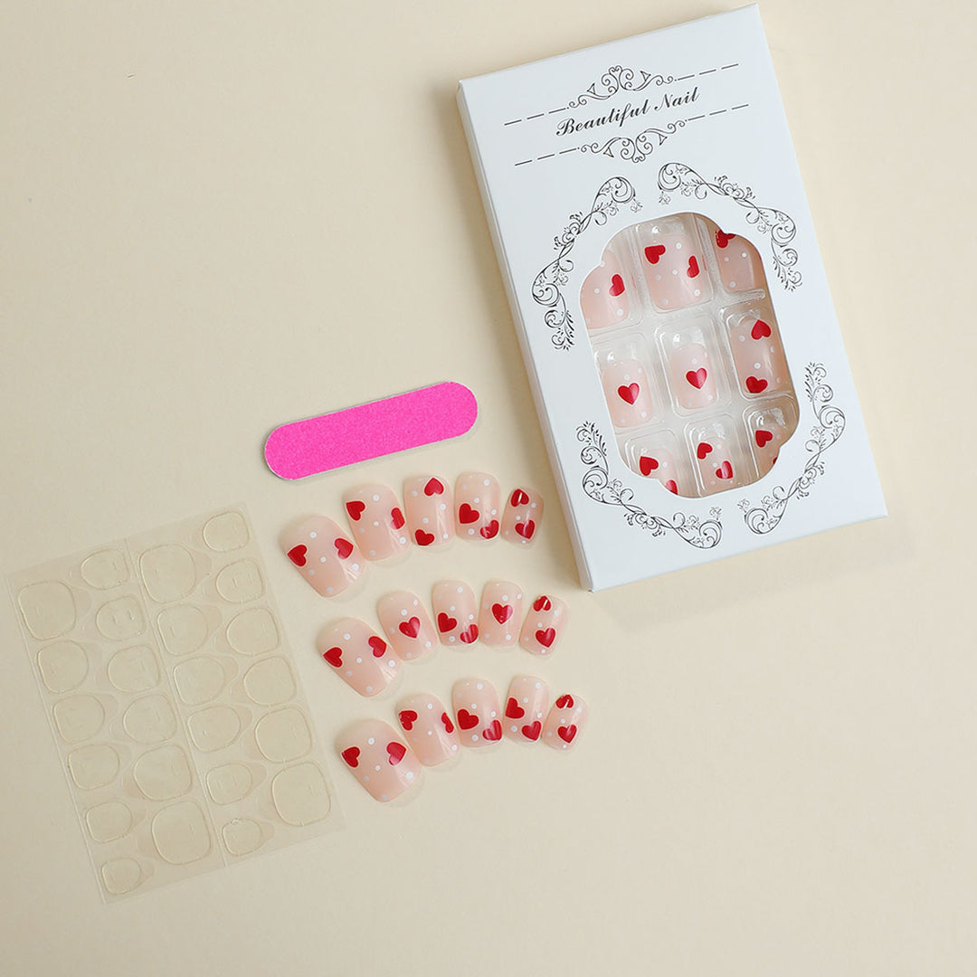 Artificial nail set with romantic heart motifs and shimmering accents Bowlift