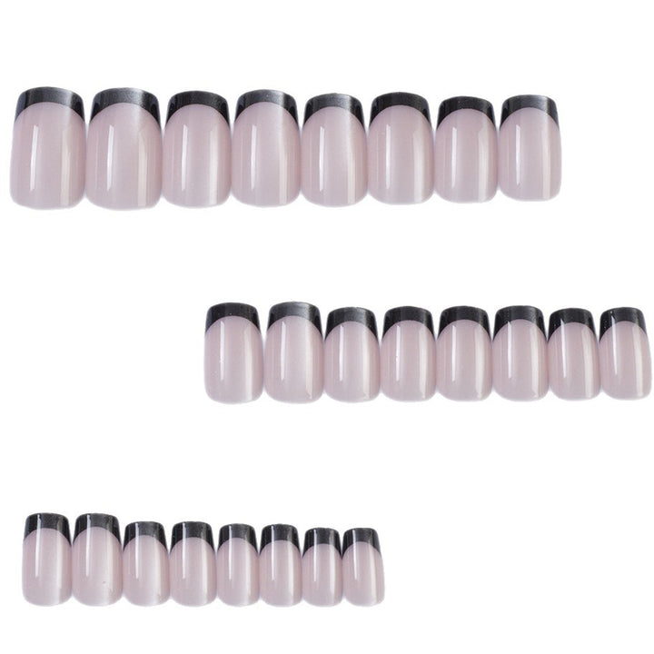 Artificial Nails in Elegant French Design with Glittering Accents Bowlift
