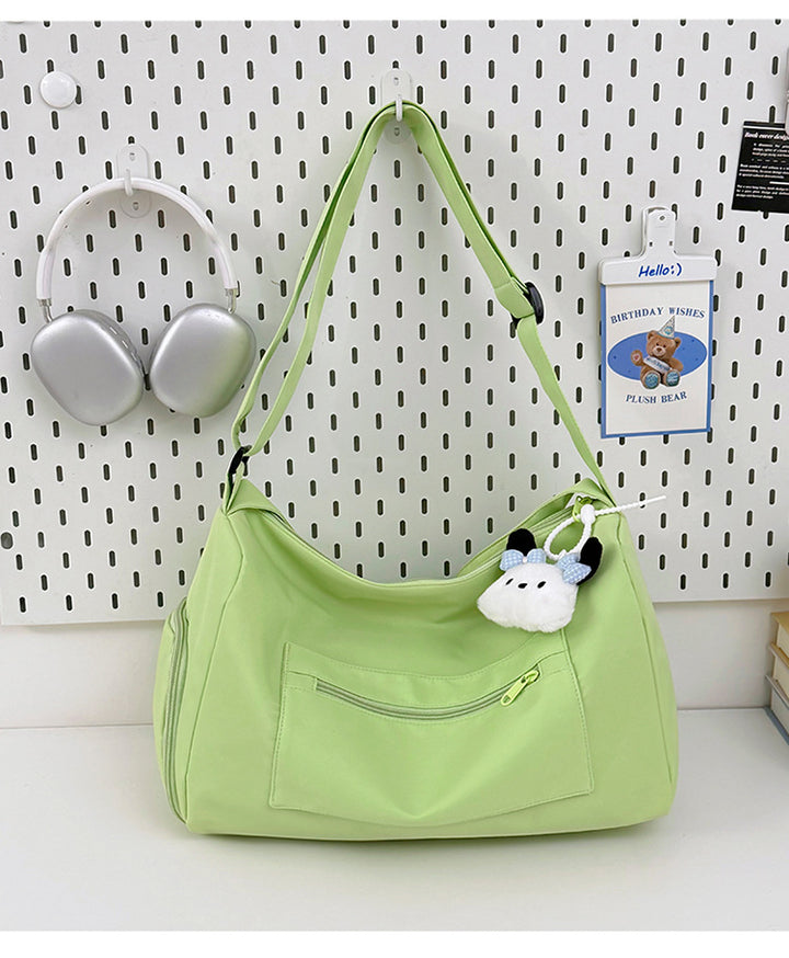 Sporty shoulder bag with spacious interior and sturdy carrying strap Bowlift