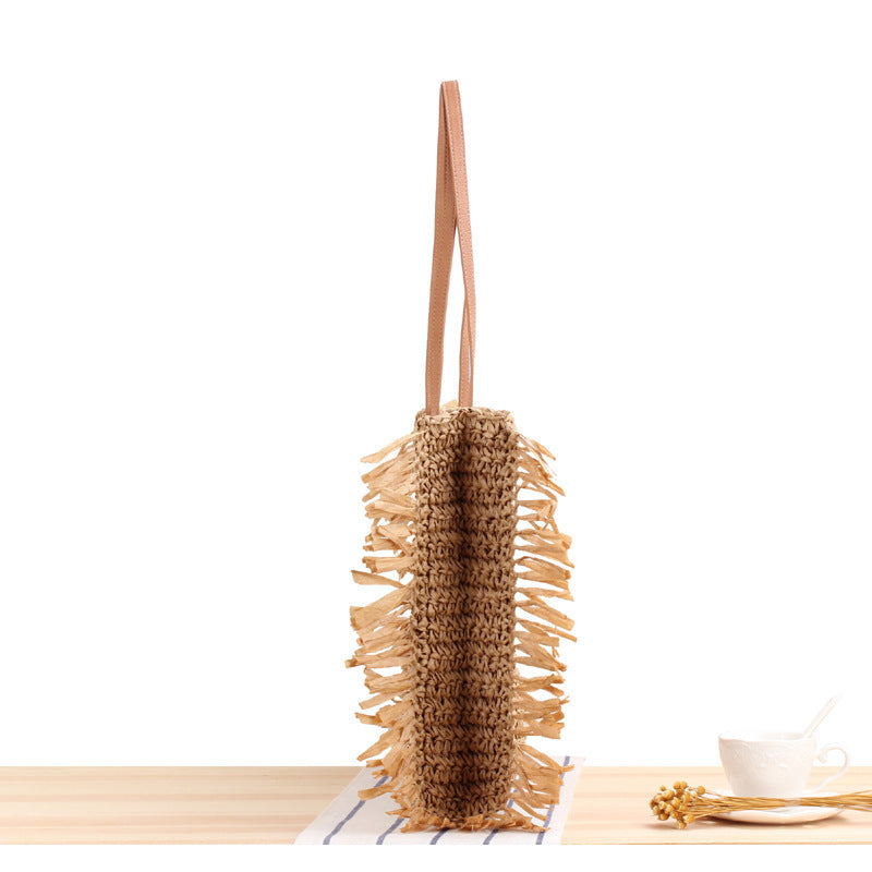 Beach bag with fringes and sturdy leather handles Bowlift