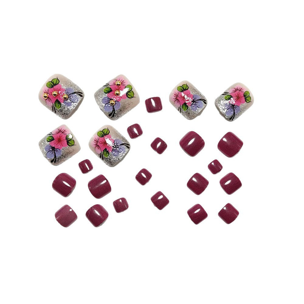 Artificial nails with floral motifs and glitter accents Bowlift