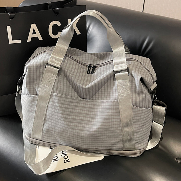 Sporty travel bag with practical storage and adjustable shoulder straps Bowlift