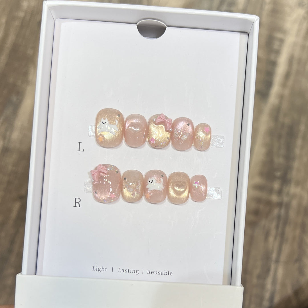 Whimsical Press-On Nail Art Set with Playful Character Designs Bowlift