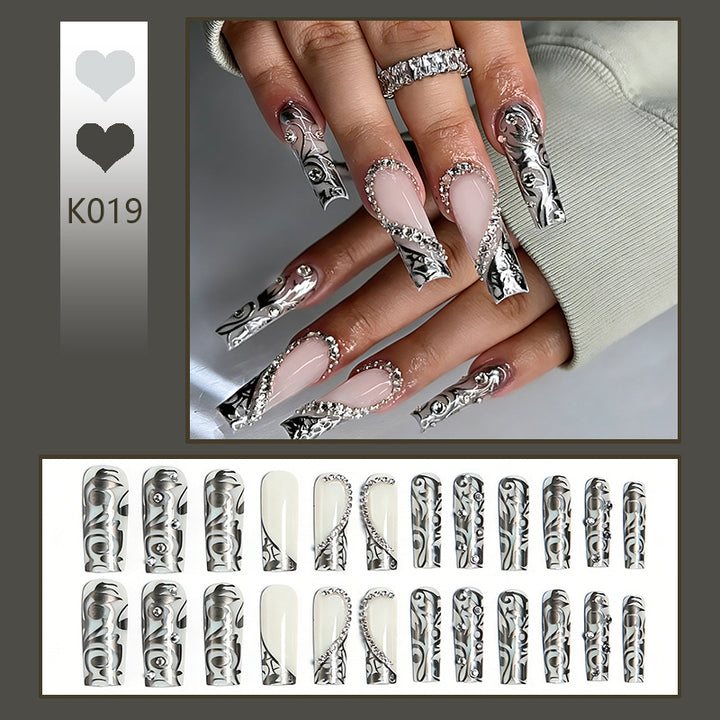 Acrylic nail set with elegant patterns and sparkling accents Bowlift