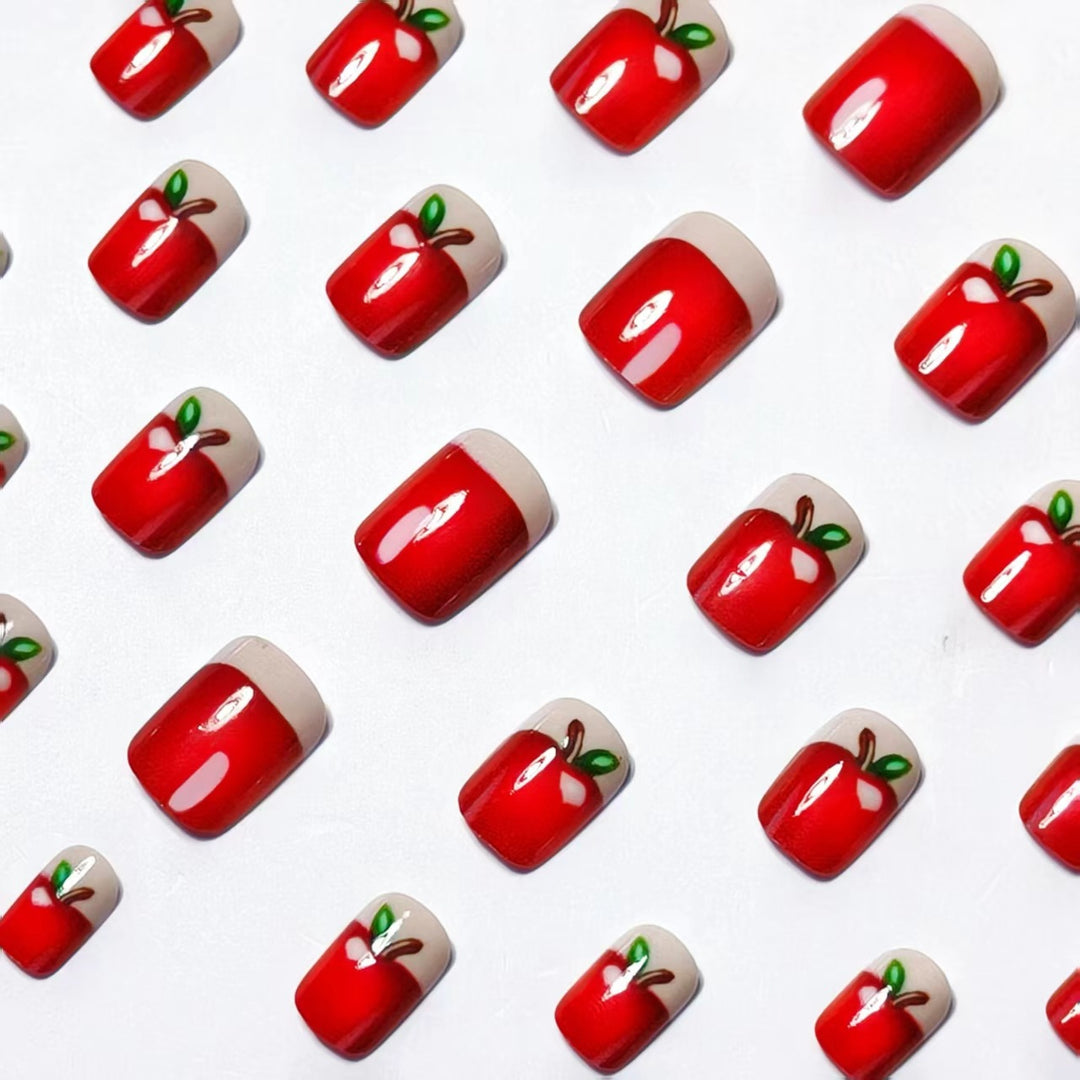 Artificial nails with playful apple motif Bowlift