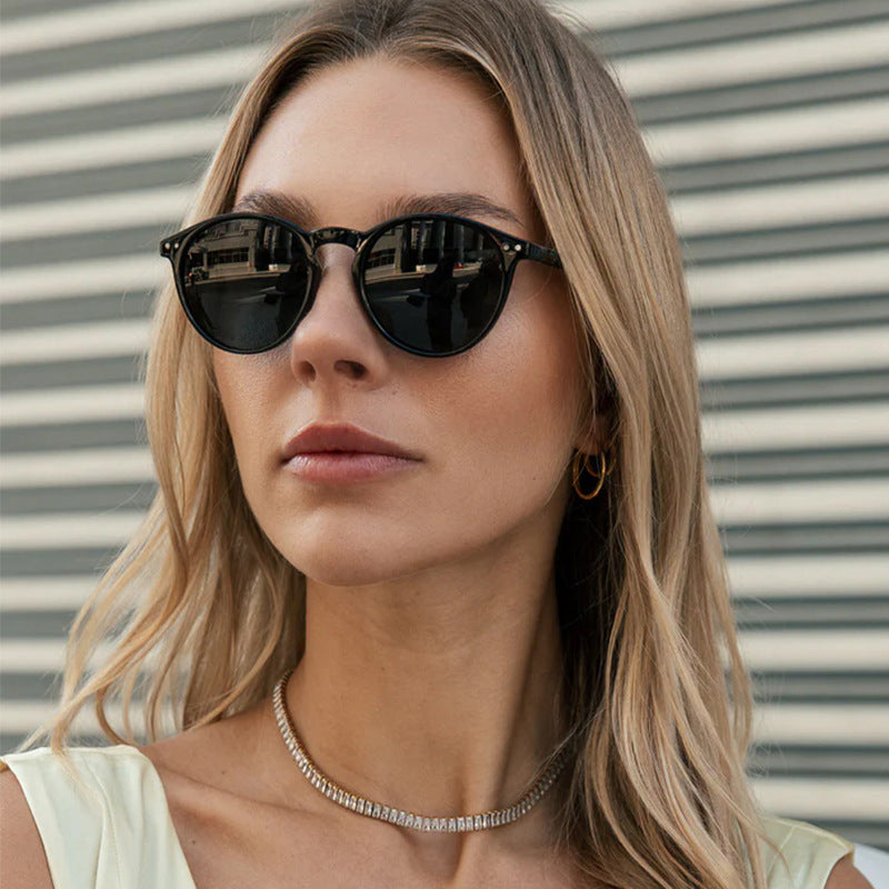 Women's fashionable round sunglasses with transparent frame and UV protection Bowlift