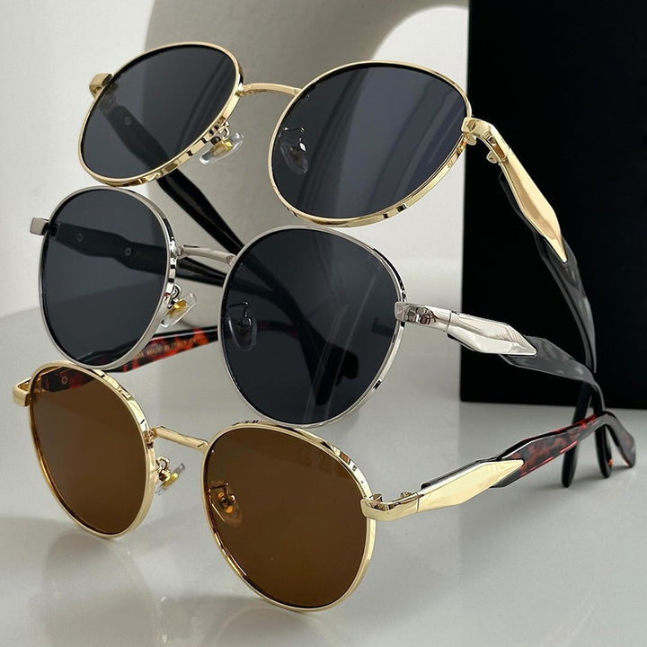 Women's round sunglasses with elegant, golden frame and UV protection Bowlift