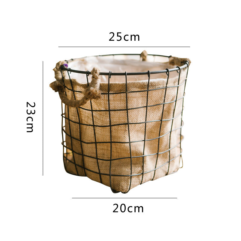Decorative storage basket made of wire and linen Bowlift