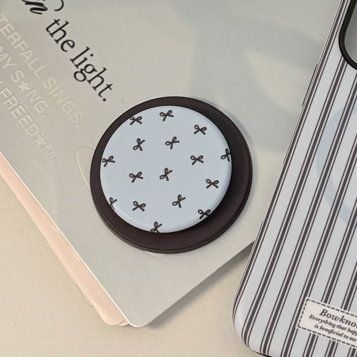 Decorative coaster with bow motif Bowlift