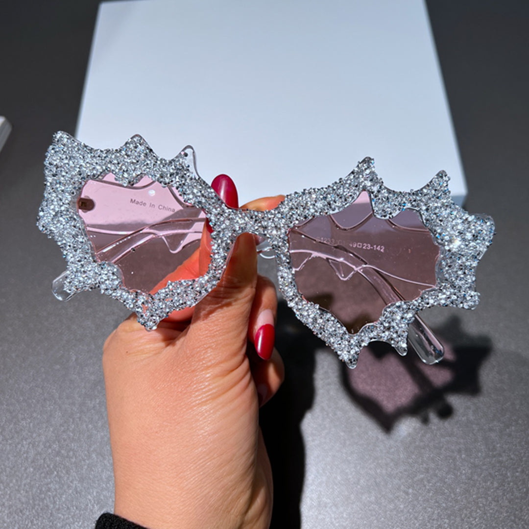 Ladies creative sunglasses in an extravagant design with glitter embellishments Bowlift