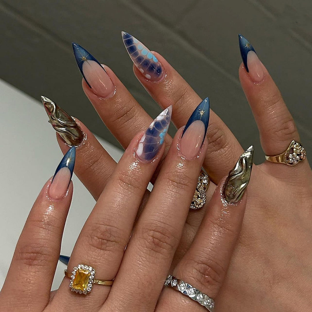 Artful stiletto nails with glitter and extraordinary design Bowlift