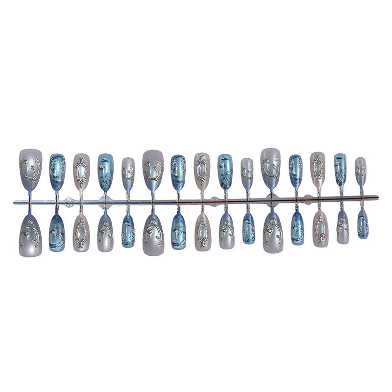 Nail art set with luxurious patterns and elegant embellishments Bowlift