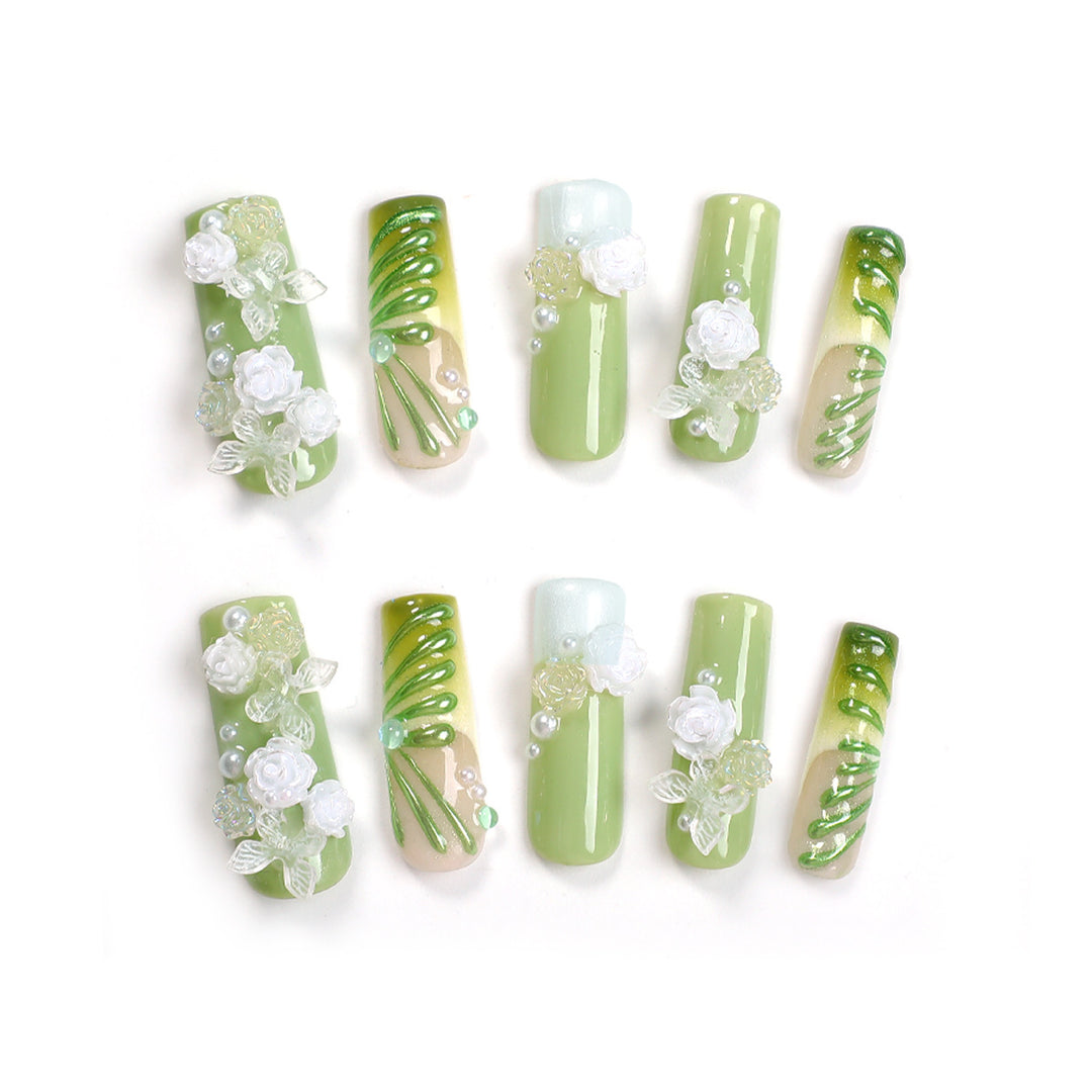 Creative nail set with floral design and delicate accents Bowlift