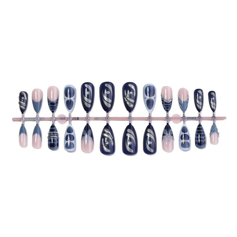 Artificial nail set with elegant maritime design and sparkling embellishments Bowlift