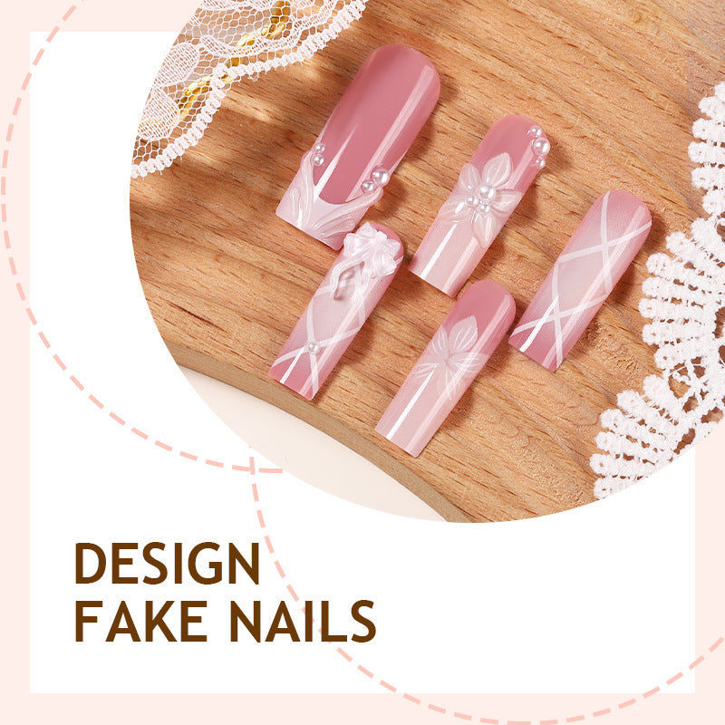 Nail set with elegant flower and glitter decorations Bowlift