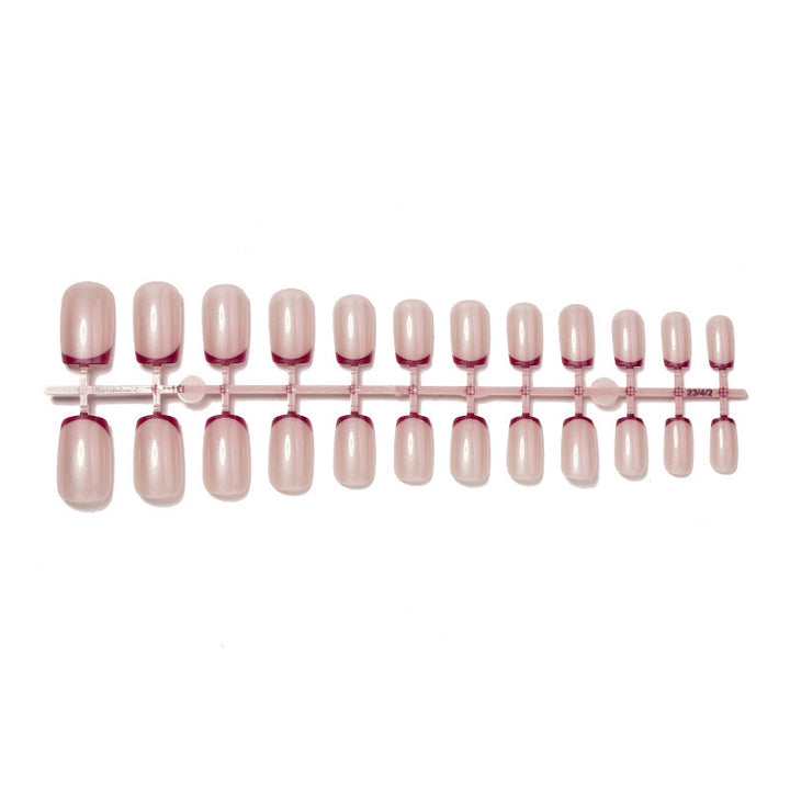 Artificial nail set with glamorous French tip design Bowlift