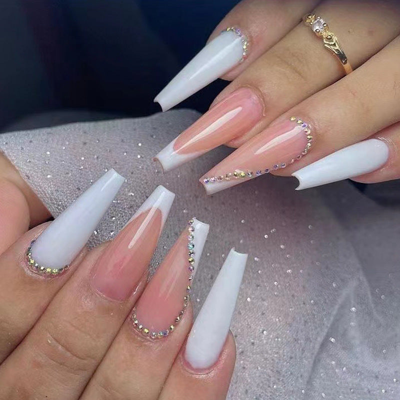 Artful nail extensions with rhinestone embellished accents Bowlift