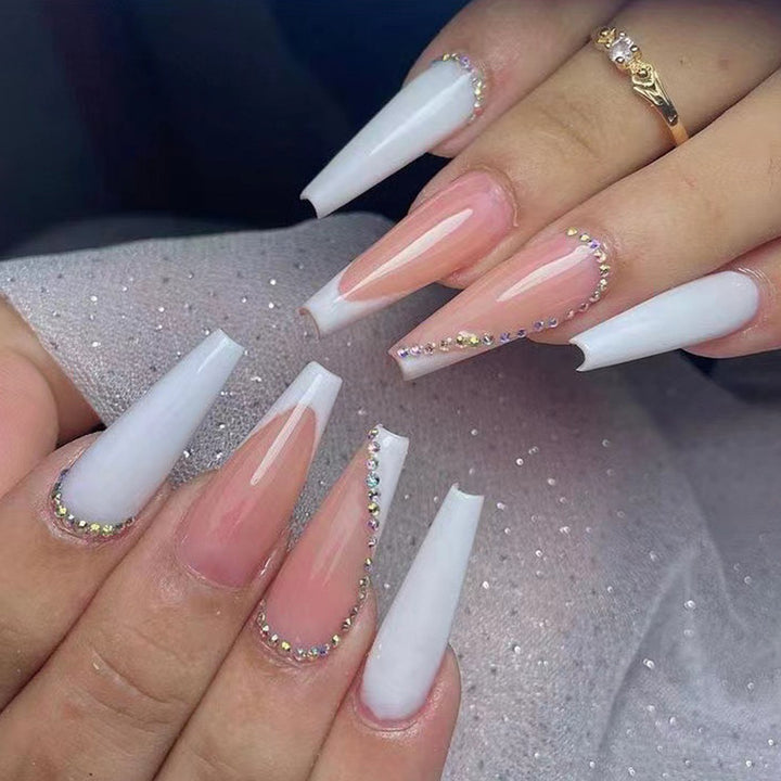 Artful nail extensions with rhinestone embellished accents Bowlift