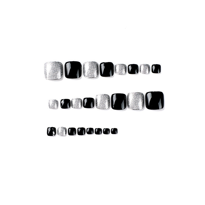 Artful toenail art with glitter and black design Bowlift