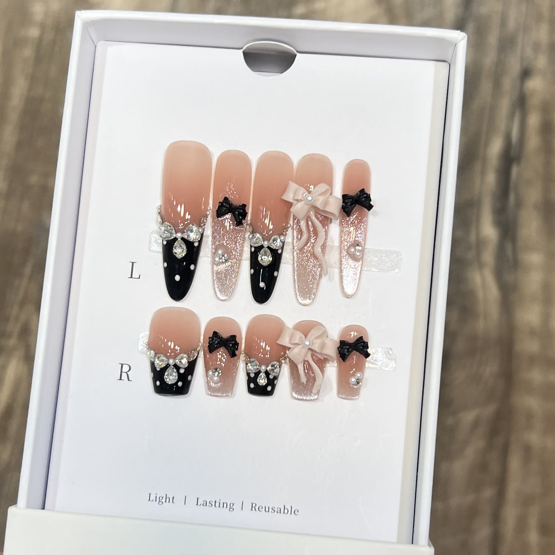 Glamorous Stiletto Press-On Nail Set with Decorative Bow and Gemstone Accents Bowlift