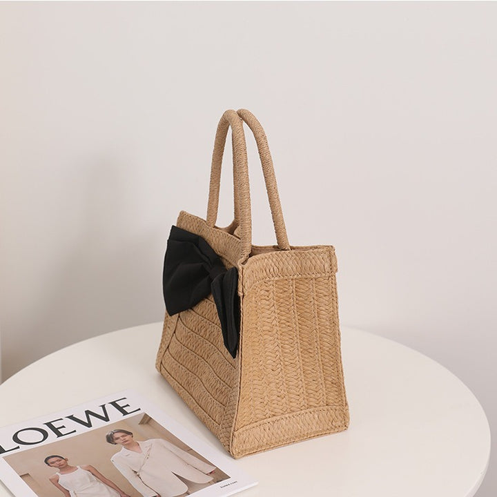 Elegant Bast handbag with bow detail Bowlift
