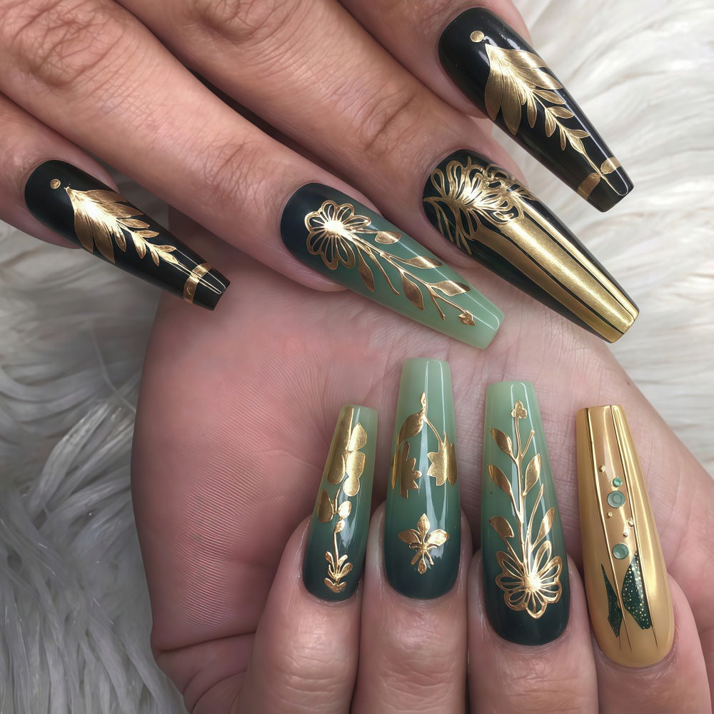 Artificial nails with floral gold embellishments Bowlift