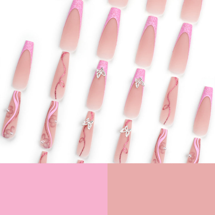 Exquisite Fingernails with Glitter and Decorative Elements Bowlift