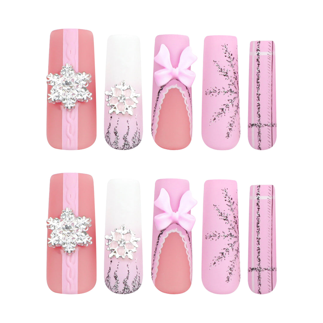 Artful nail extensions with festive decorations Bowlift