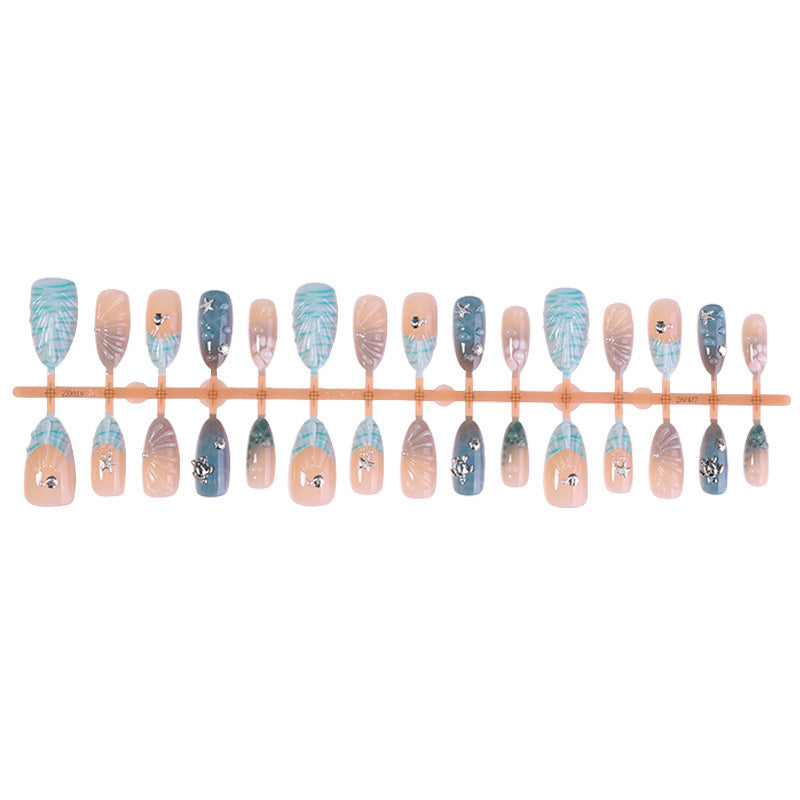 Creative nail art set with maritime accents and glitter decorations Bowlift