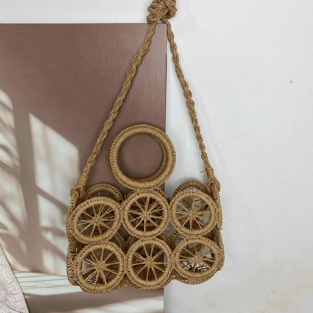 Artisan woven basket bag with striking wheel pattern Bowlift
