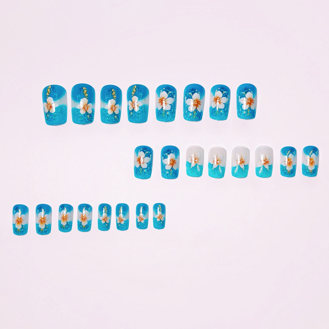 Artificial nails with floral accents and glitter patterns Bowlift