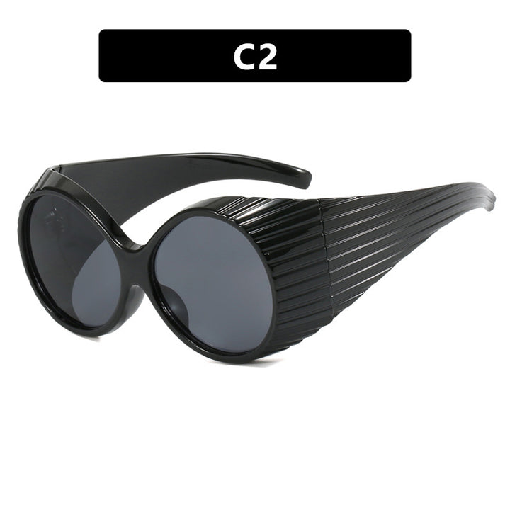 Women's extravagant sunglasses with curved frame Bowlift