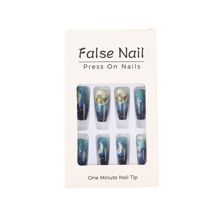 Dreamy artificial nails with moon and star design Bowlift