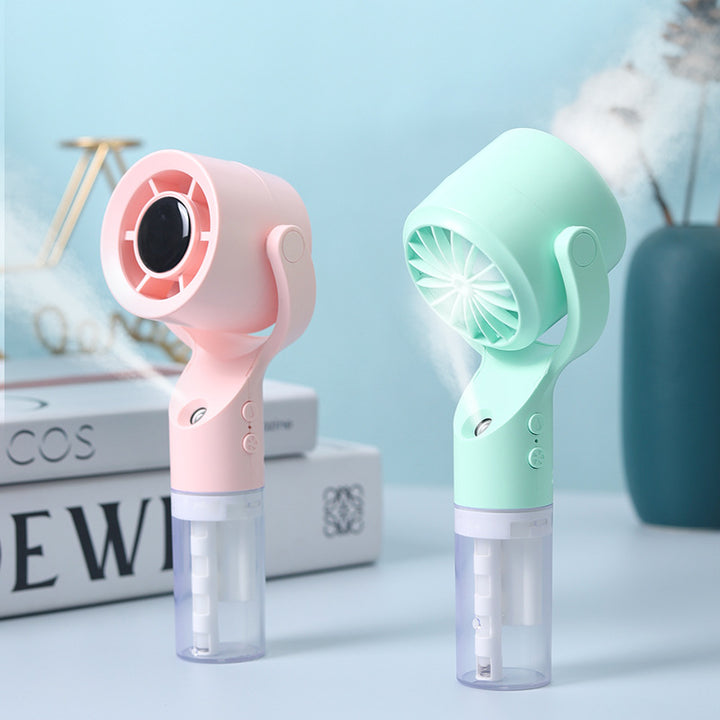 Cooling portable handheld misting fan with detachable water reservoir adjustable tilt and cute animal ears Bowlift