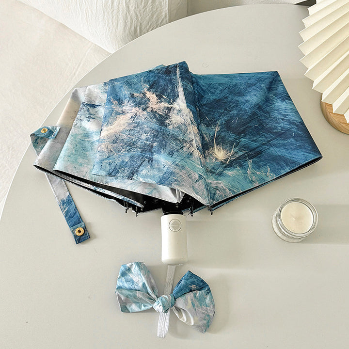 Ladies elegant folding umbrella with unique marble pattern Bowlift