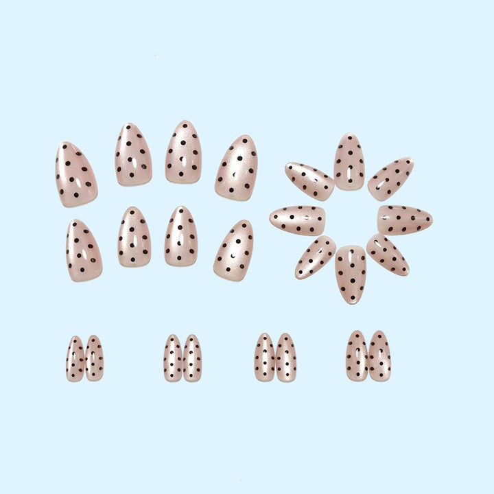 Artificial nails in modern polka dot design Bowlift