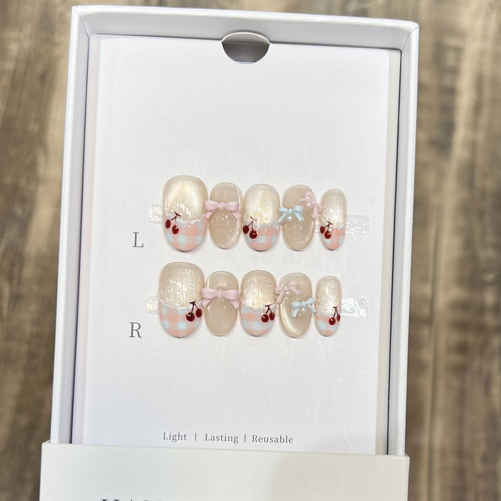Decorative Press-On Nail Art Set with Charming Bow and Cherry Accents Bowlift