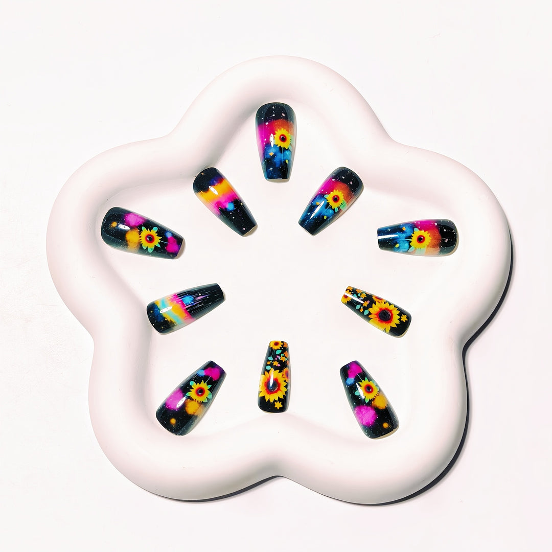Artificial nails in creative sunflower and galaxy design Bowlift