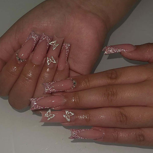 Glamorous stiletto artificial nails with glitter and crystal elements Bowlift