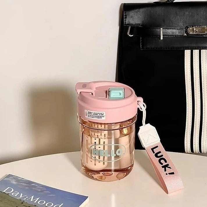 Ladies stylish drinking bottle with integrated carrying system Bowlift