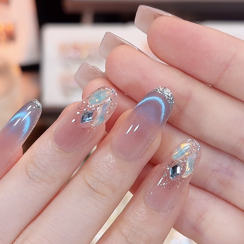 Artificial nail set with sparkling glitter accents Bowlift