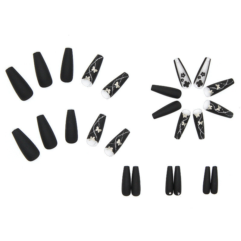 Art nail set with elegant butterfly and flower motifs Bowlift